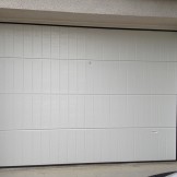 Réalisation d'une porte de garage manuelle PVC BPSC Océane